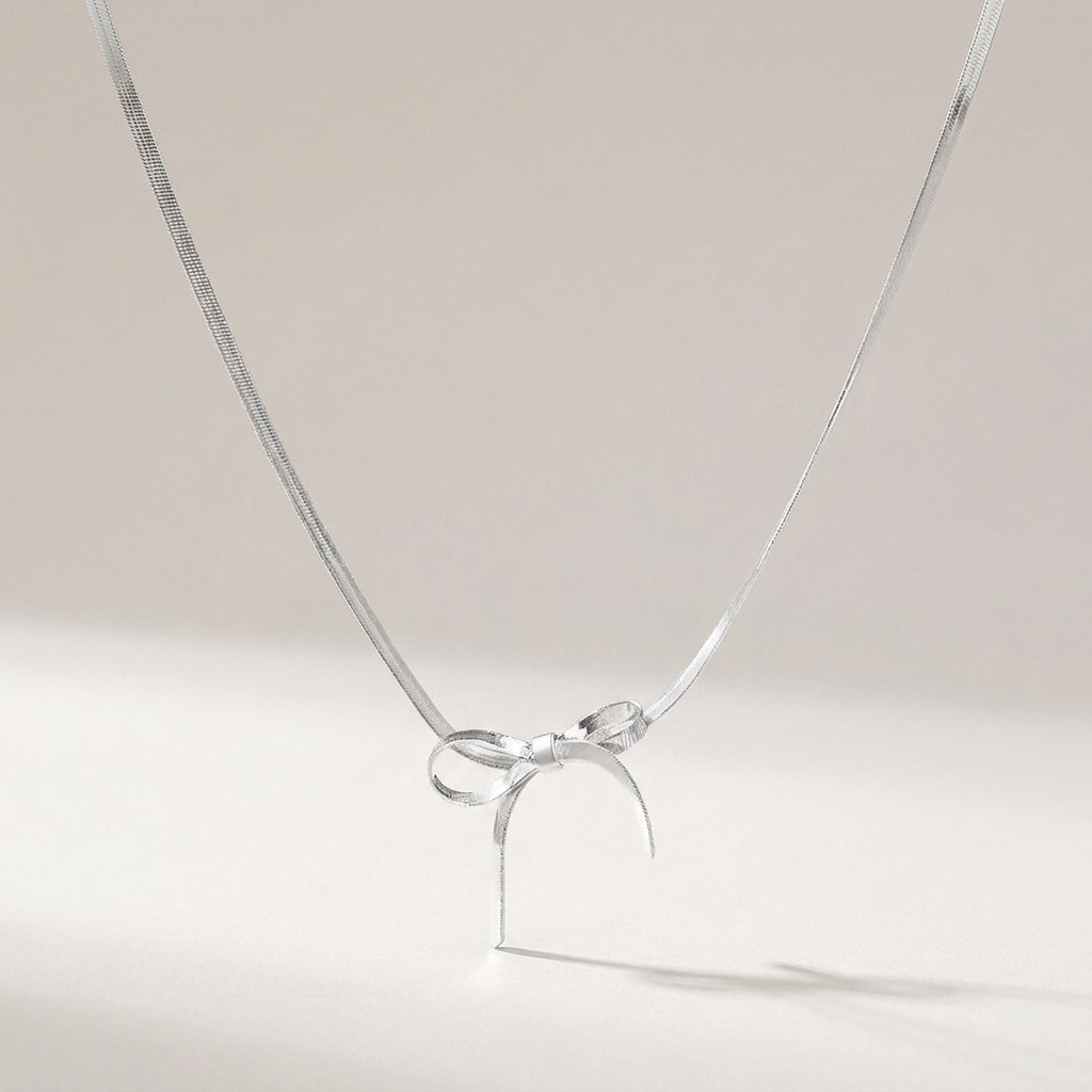 Carol Bow Necklace — Silver