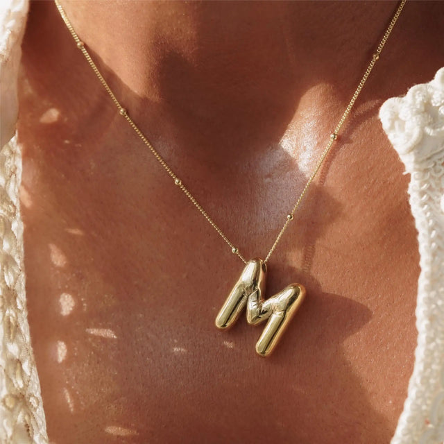 Bubble Letter Initial Necklace worn