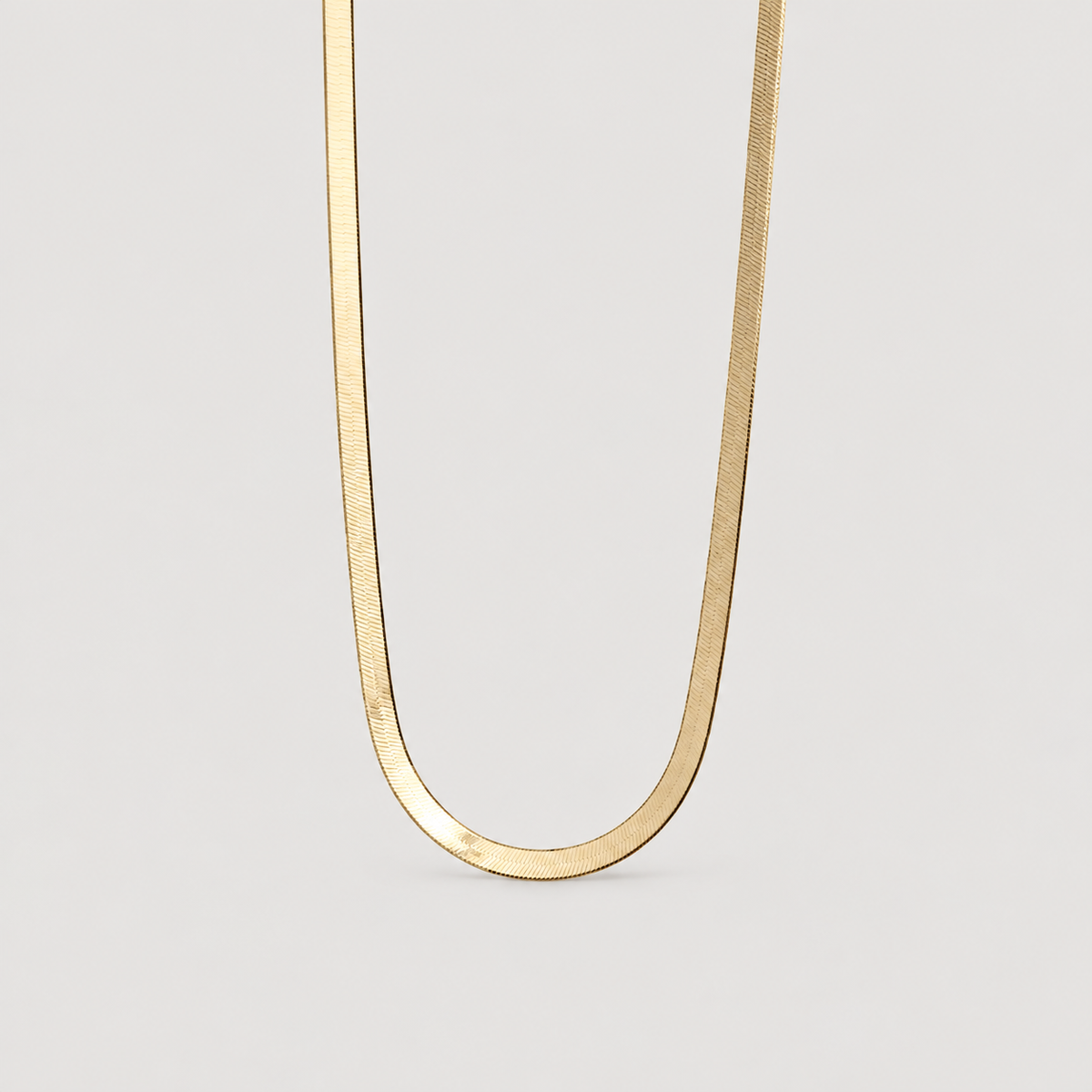 Chelsea Herringbone Necklace — studio product photograph