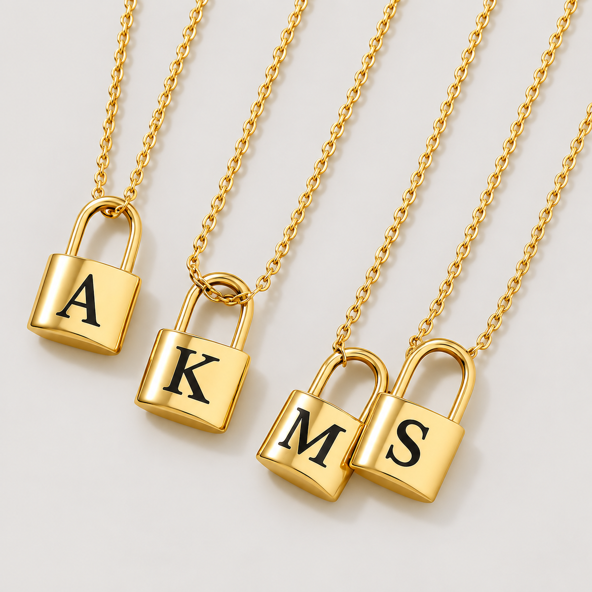 Ellie® Initial Love Lock 18k Gold Necklace — studio product photograph