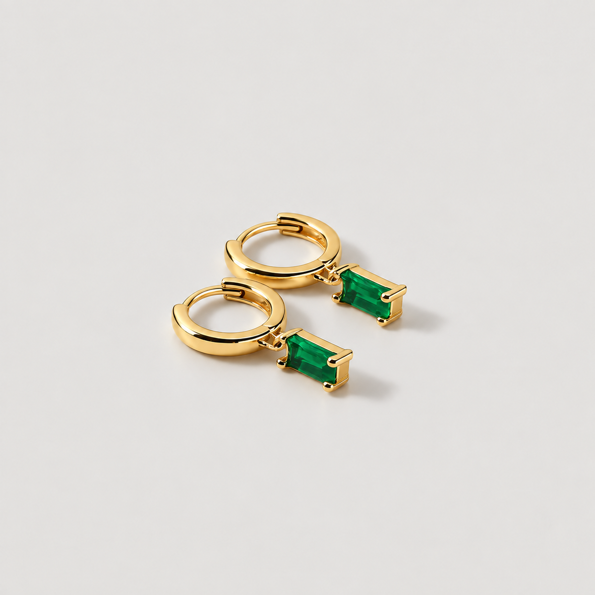 Bella Birthstone Huggies Earrings — studio product photograph