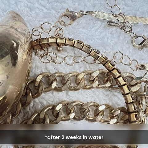 Other jewelry — tarnished after water exposure